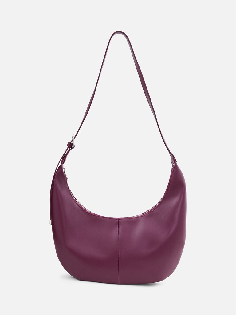 Semi-circular bag with long shoulder strap