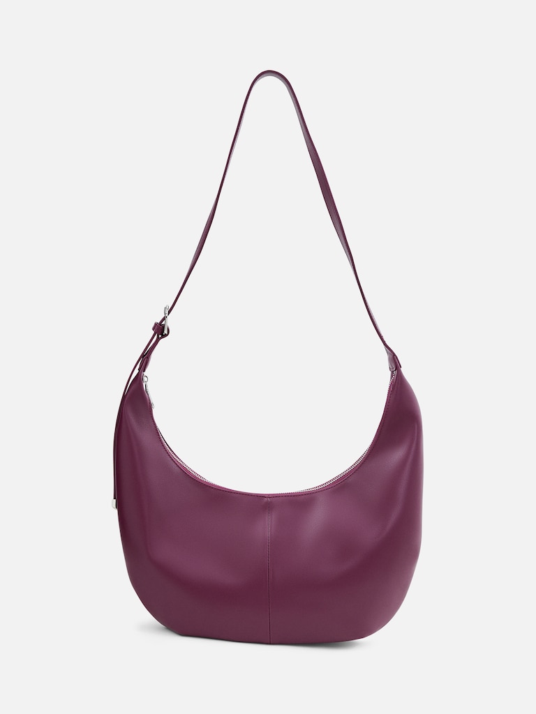 Semi-circular bag with long shoulder strap