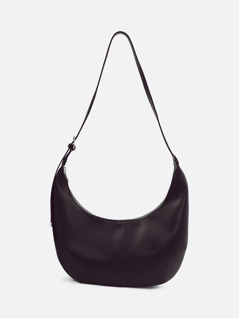 Semi-circular bag with long shoulder strap