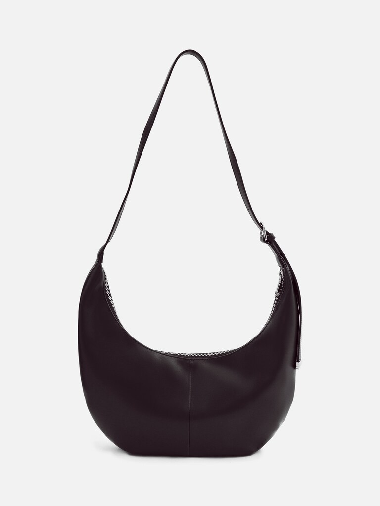 Semi-circular bag with long shoulder strap