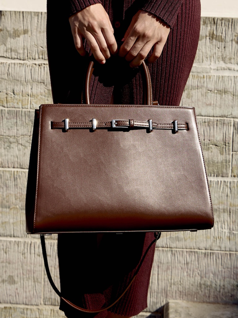 Rectangular bag with decorative strap