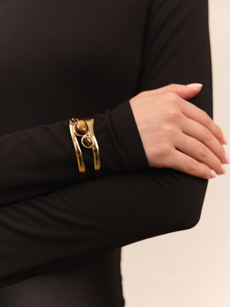 Металлический браслет с объемными камнями