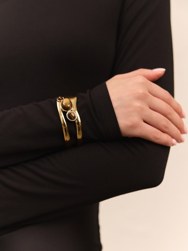 Металлический браслет с объемными камнями