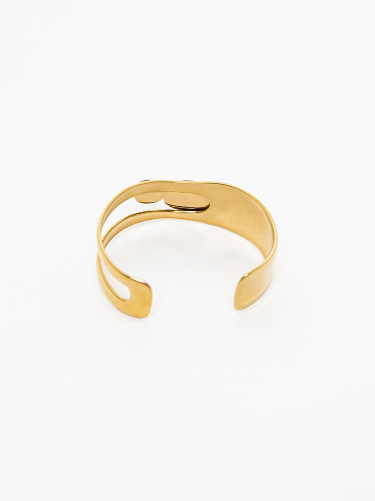 Металлический браслет с объемными камнями