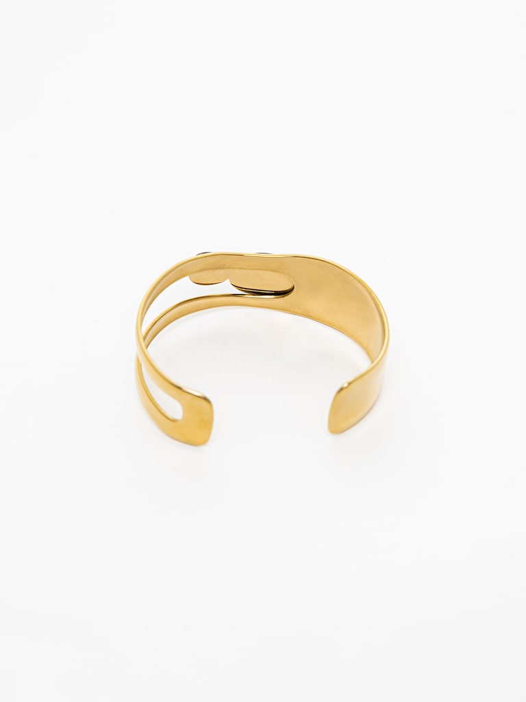 Металлический браслет с объемными камнями