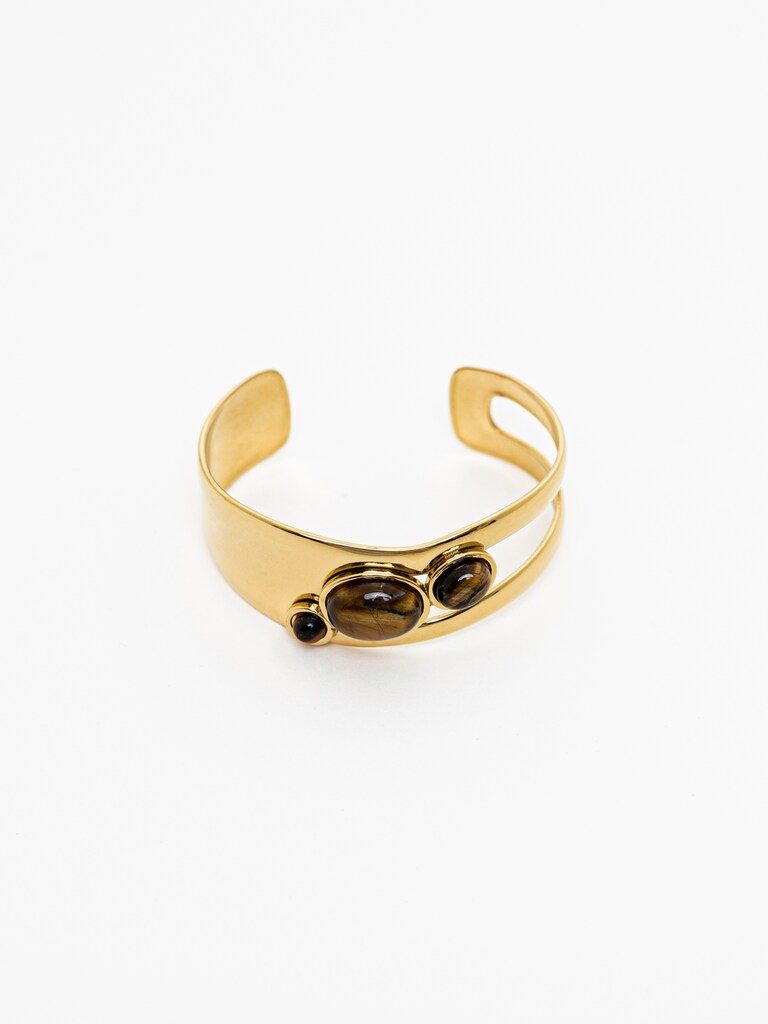 Металлический браслет с объемными камнями