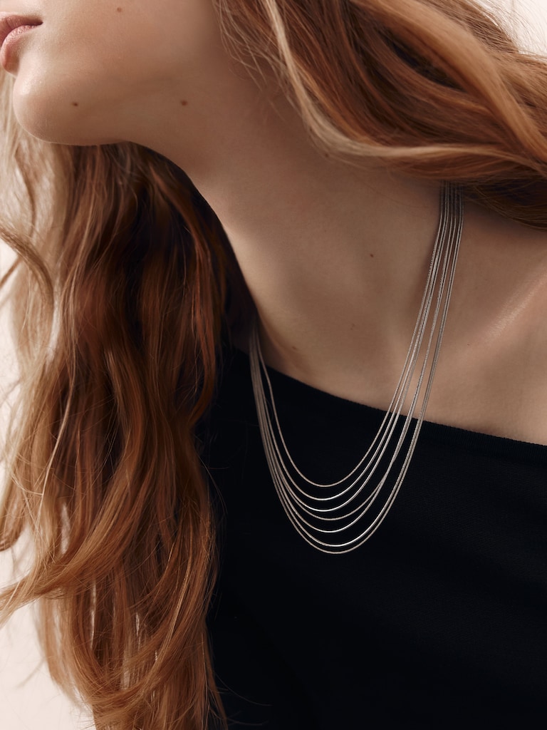Multi-level necklace of fine chains