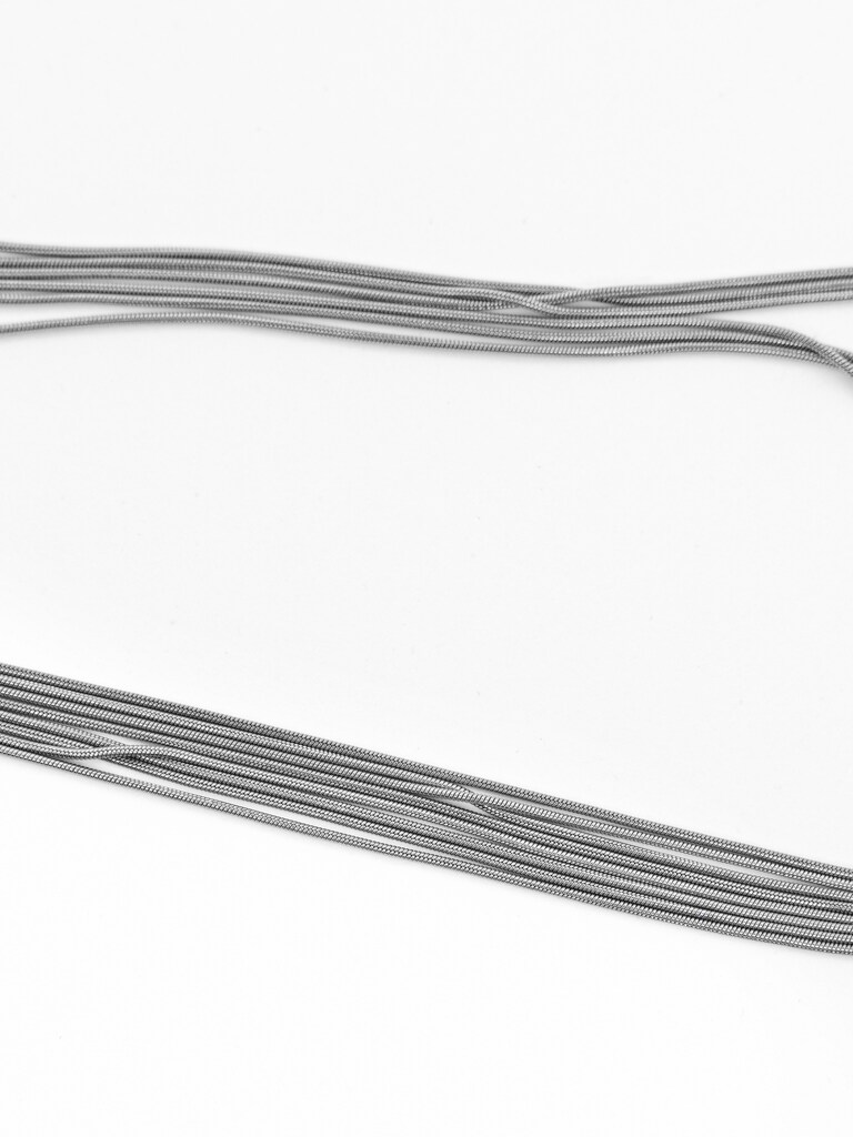 Multi-level necklace of fine chains