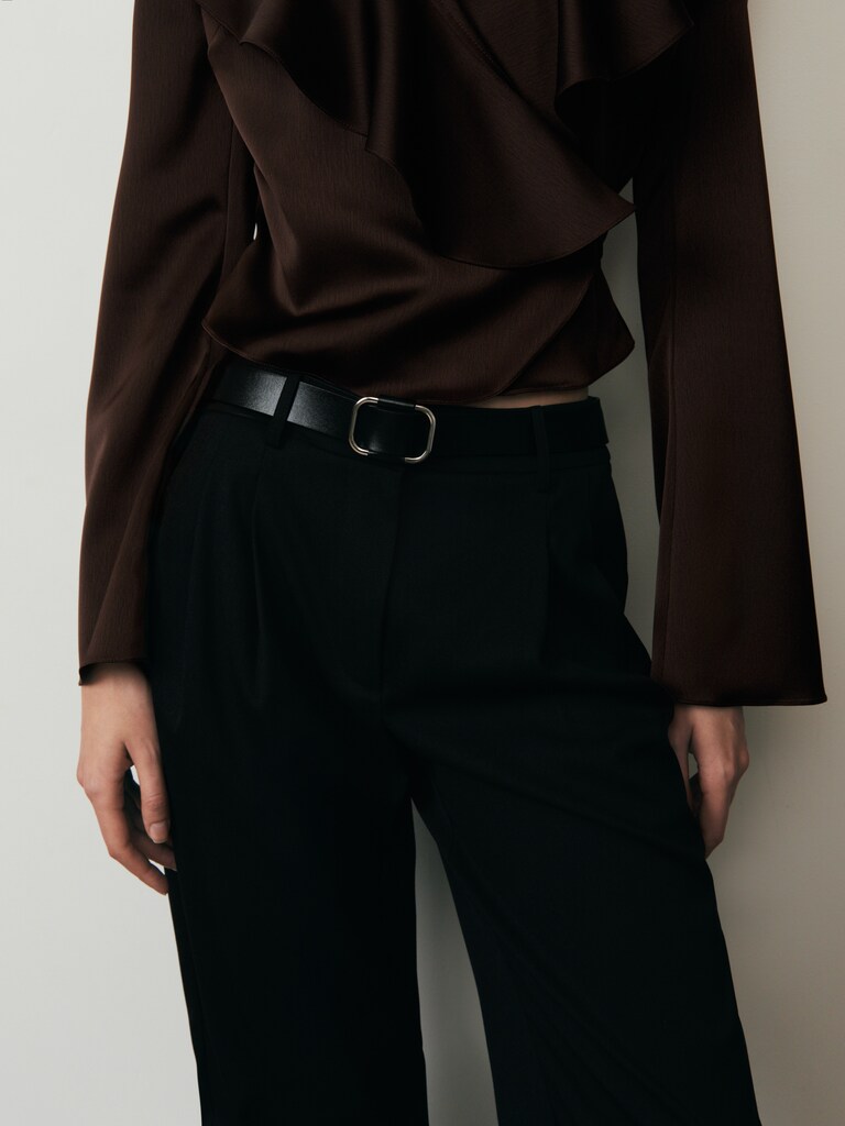 Leather belt with decorative buckle