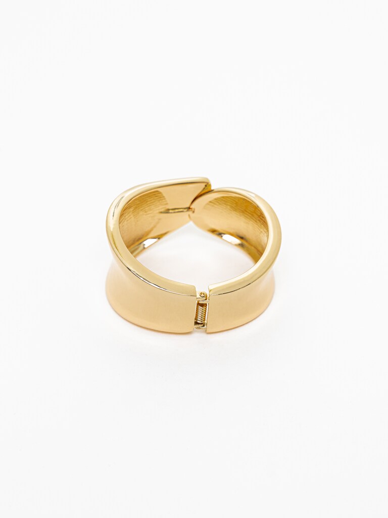 Изогнутый браслет из гладкого металла