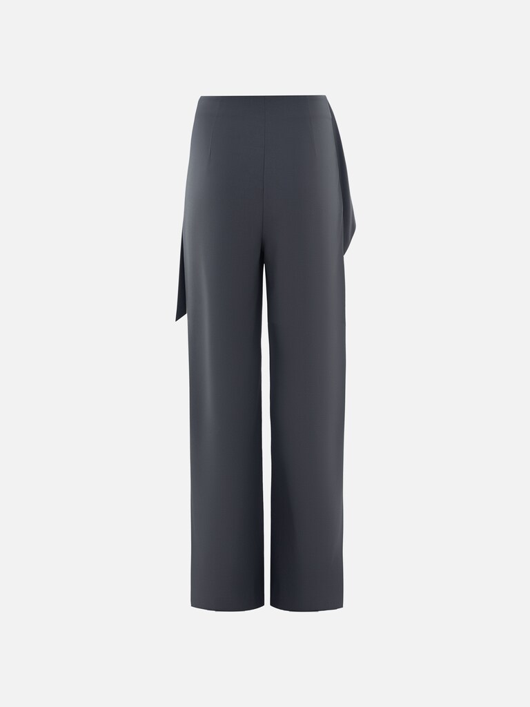 Loose-fit trousers with draping at the hips