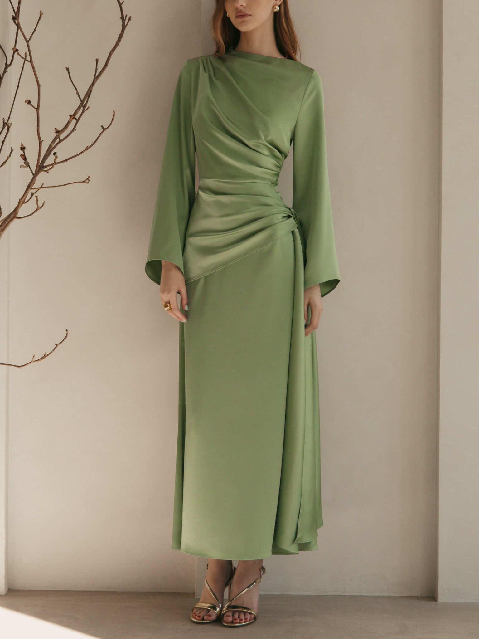 Maxi satin dress with long sleeves and asymmetrical draping