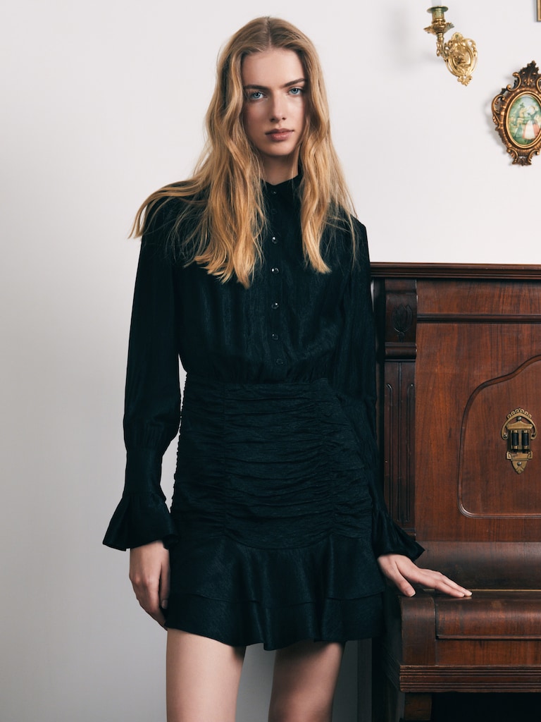 Mini dress with gathered skirt and small matching buttons