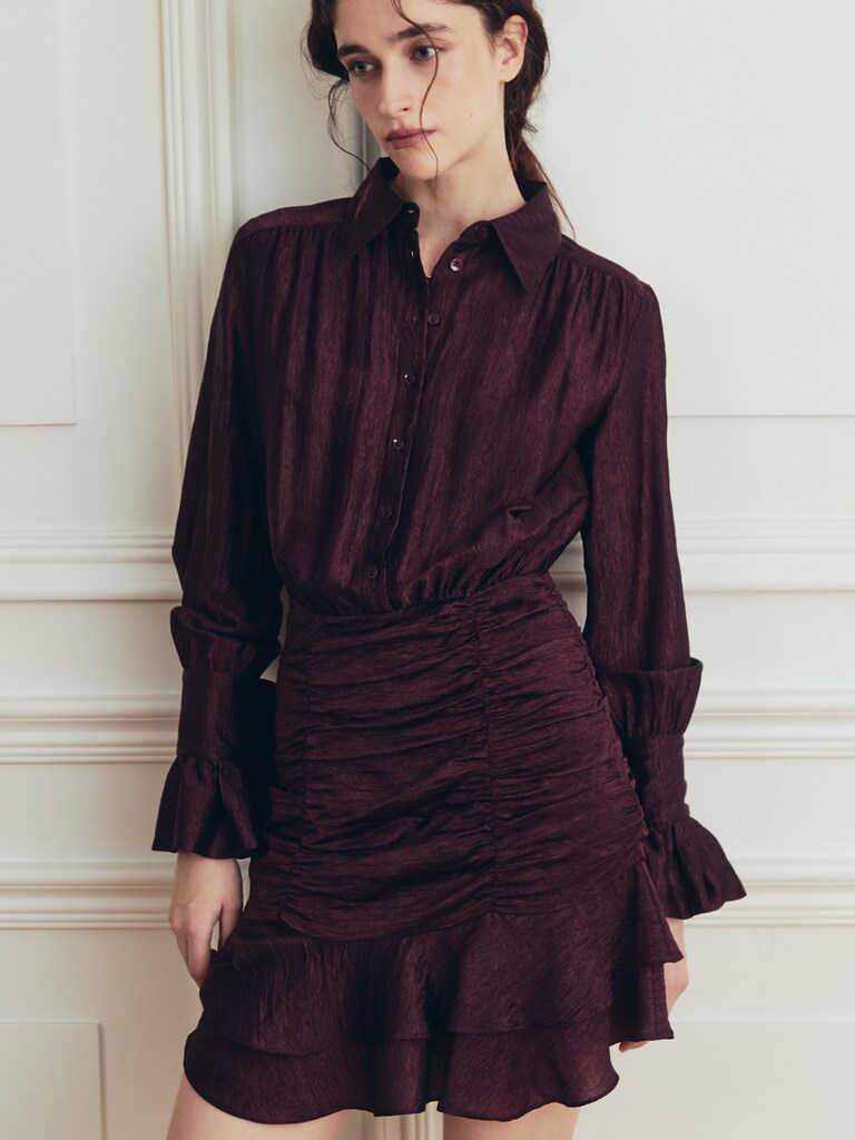 Mini dress with gathered skirt and small matching buttons