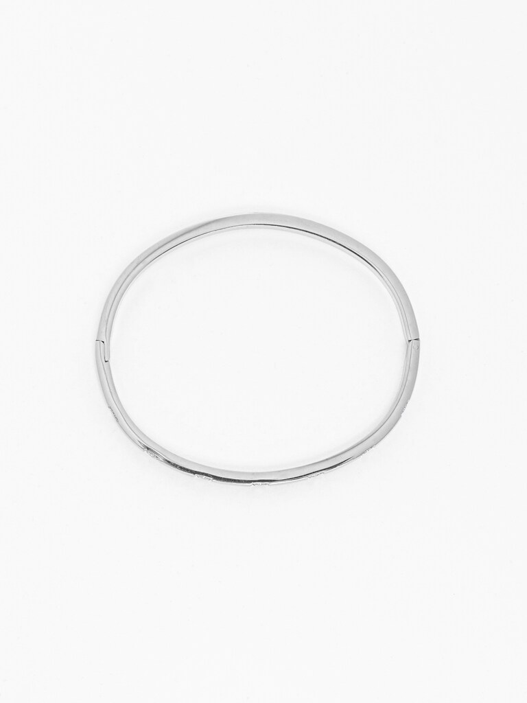 Тонкий браслет с круглыми кристаллами