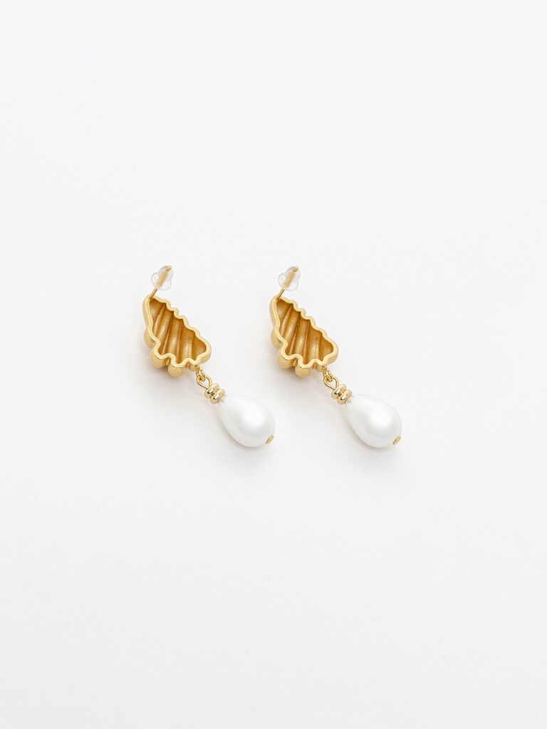 Stud earrings with intricate designs and teardrop pendants