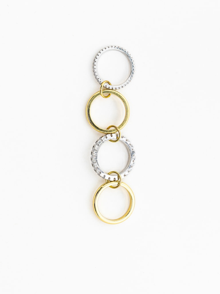 Multi-layered two metal ring with rhinestones