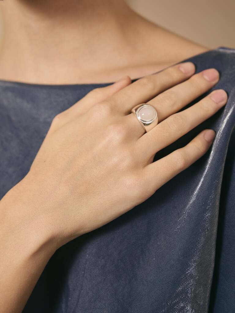 Silvertone ring with round crystal