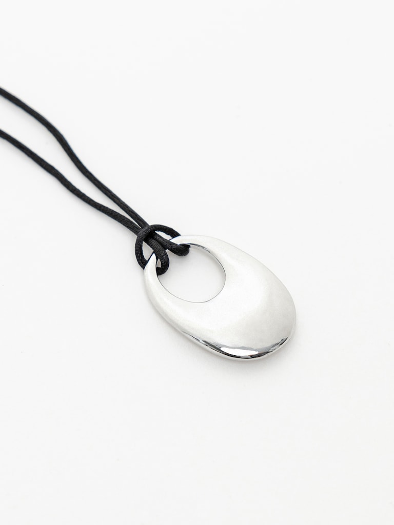 Lace necklace with metal pendant