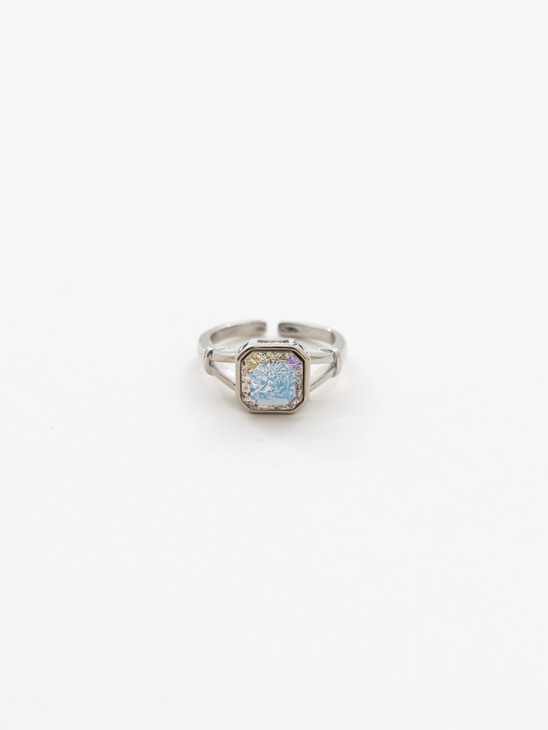 Wide silvertone ring with large crystal