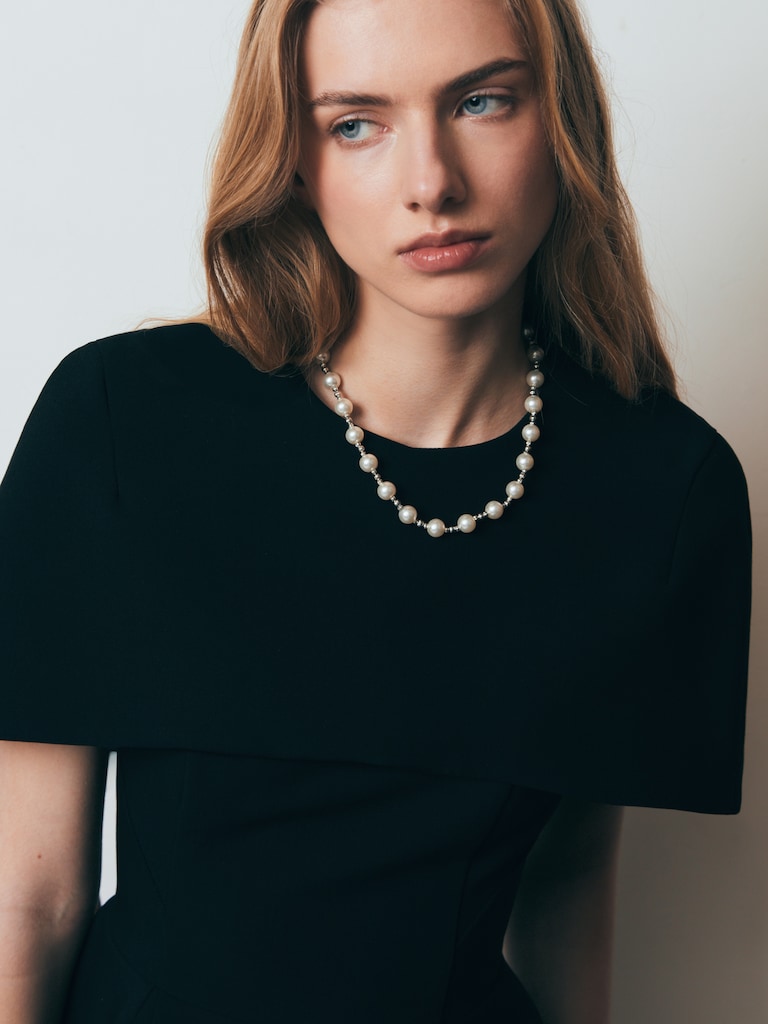 Necklace with silvertone beads and pearls