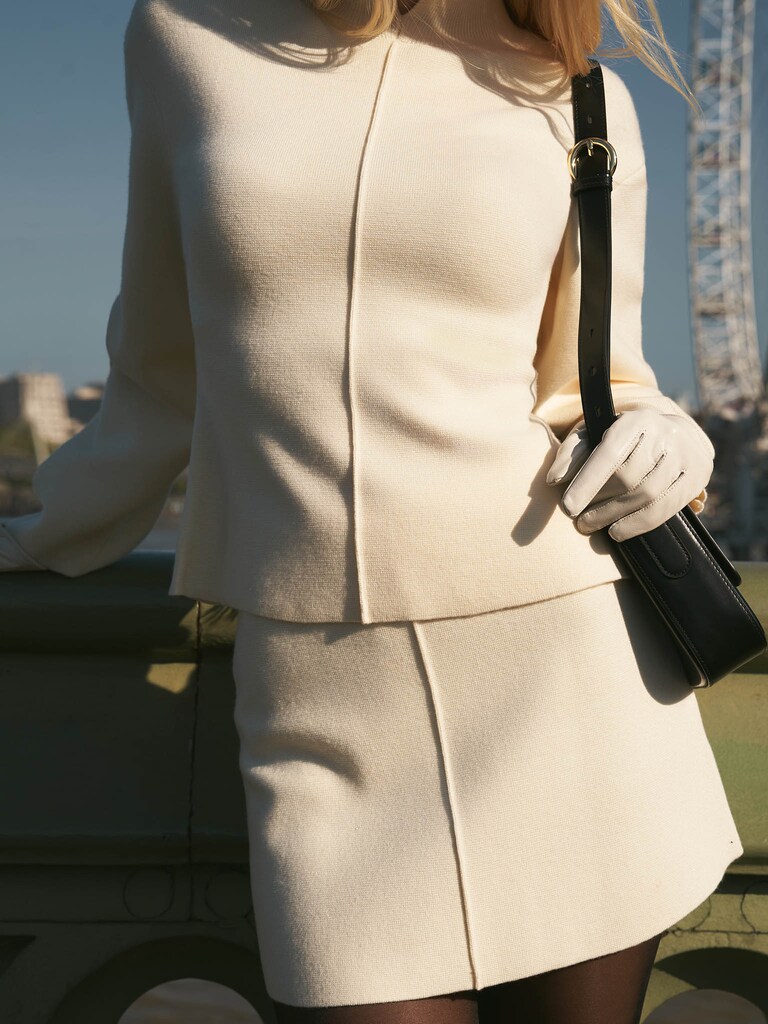 Straight mini skirt with a decorative seam 