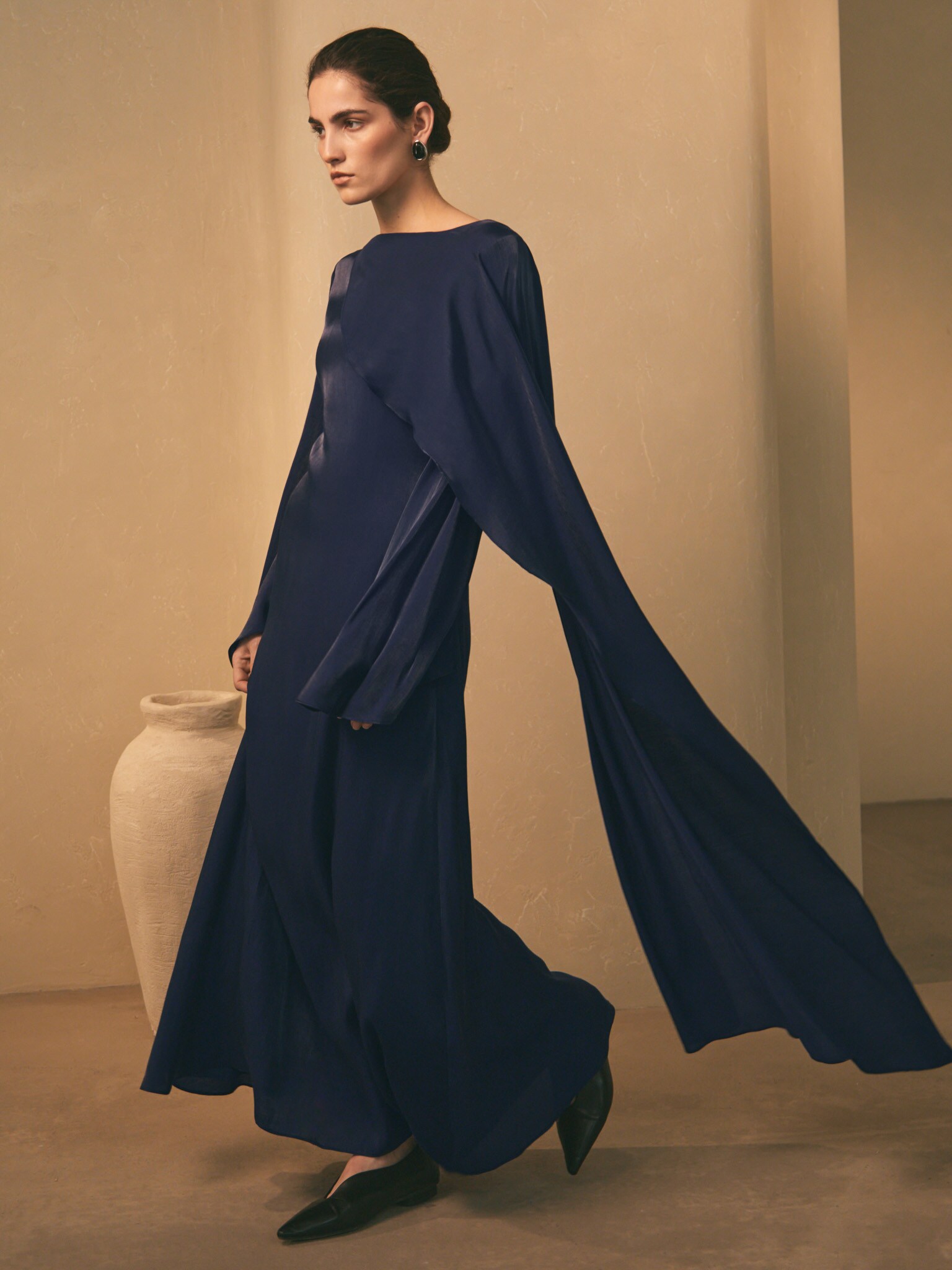 Textured maxi dress with one shoulder cape