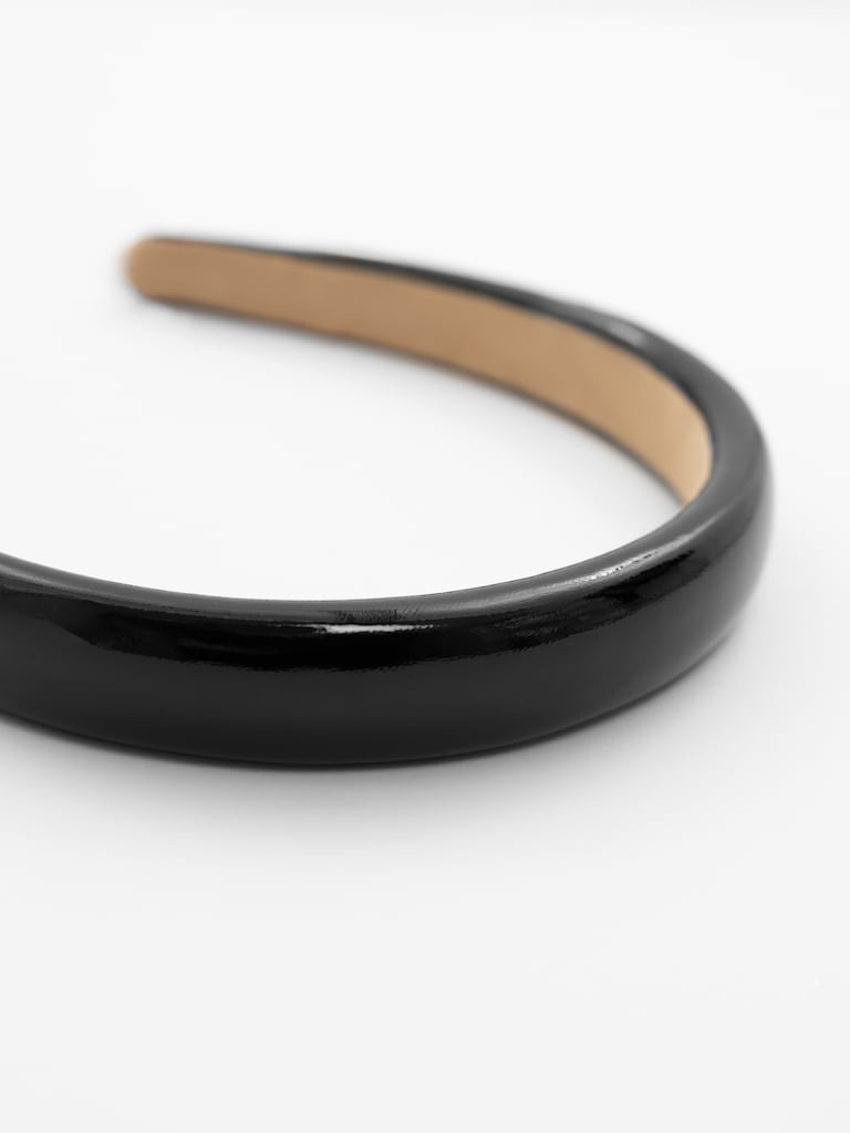 رباط شعر من الجلد البيئي المطلي