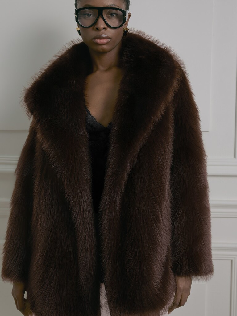Short loose-fitting eco-fur coat with stand-up collar