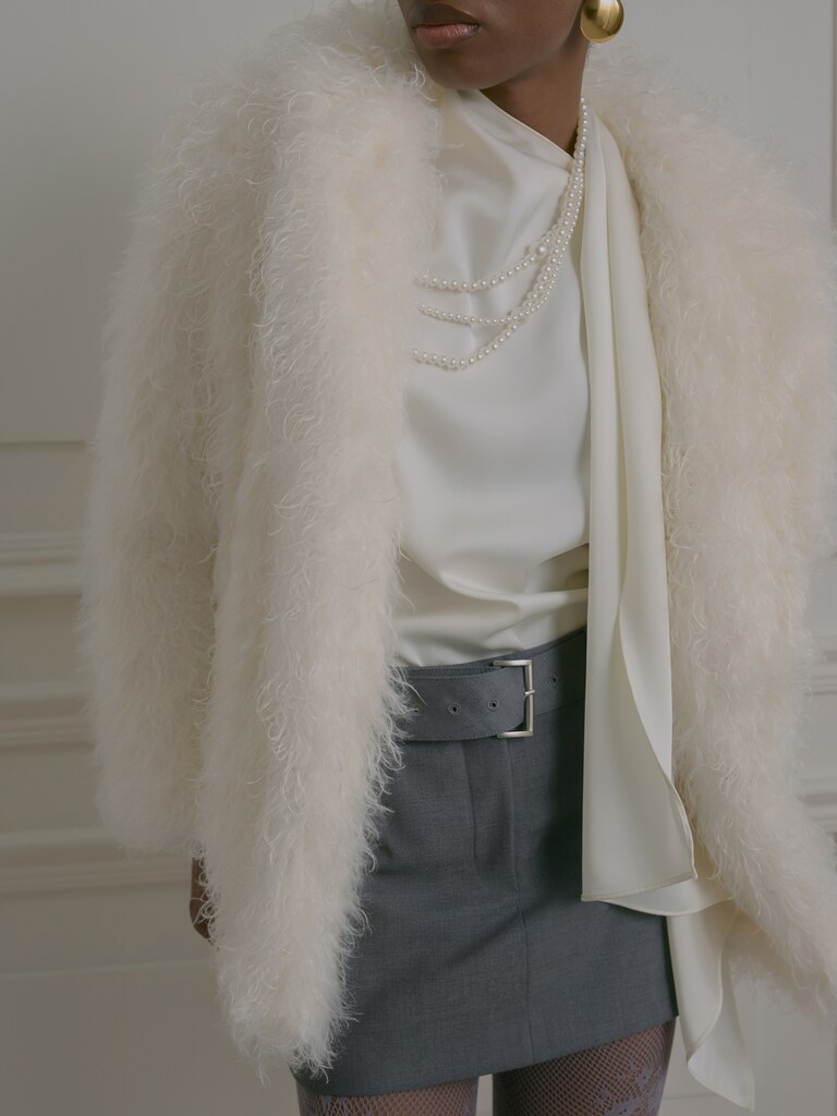 Short eco-fur coat with voluminous pile