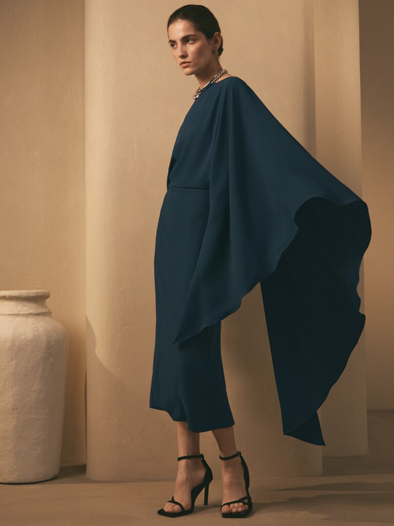 Midi dress with a long train and open back