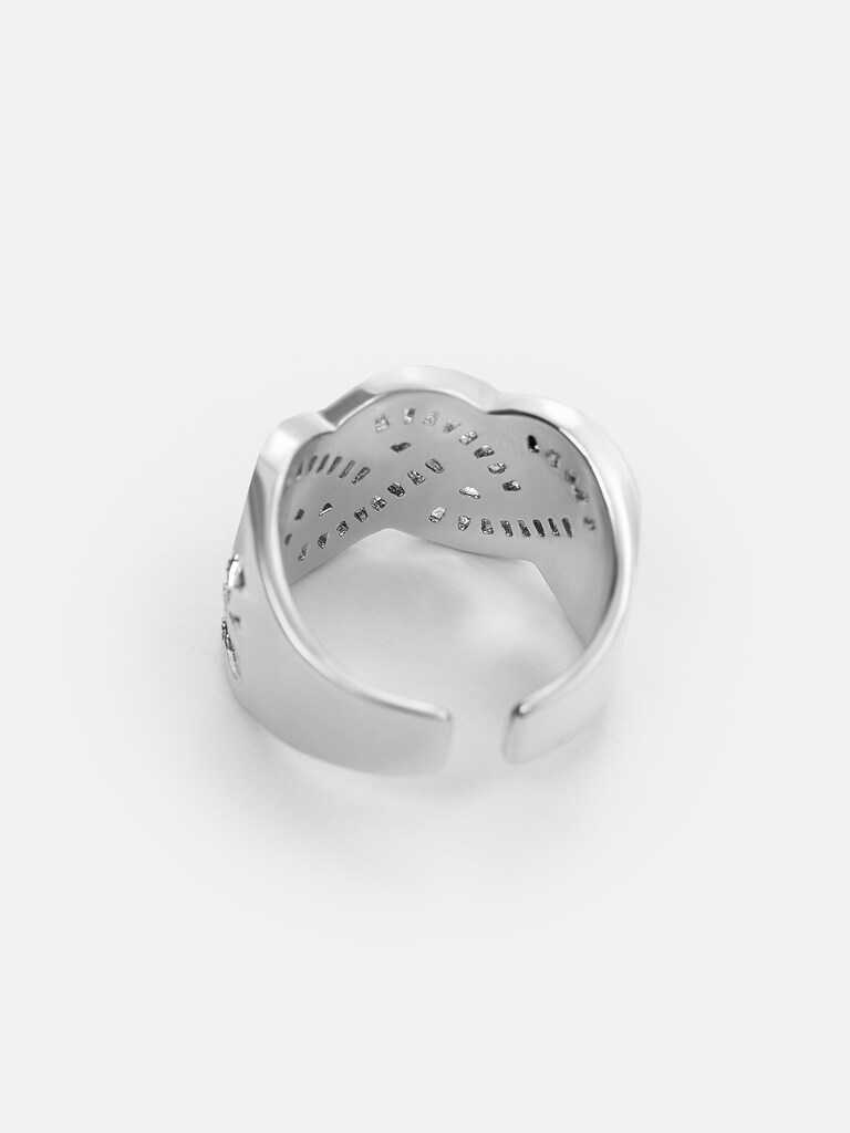 Ring with braided design and crystal decoration